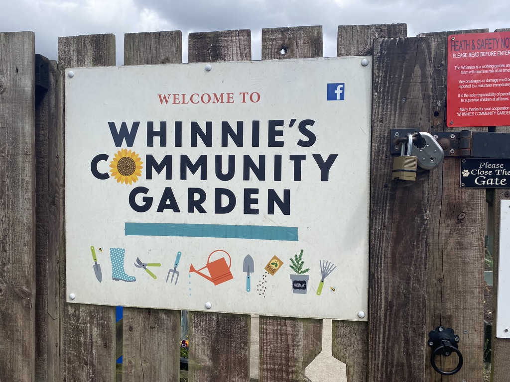 Entrance sign to Whinnie's Community Garden