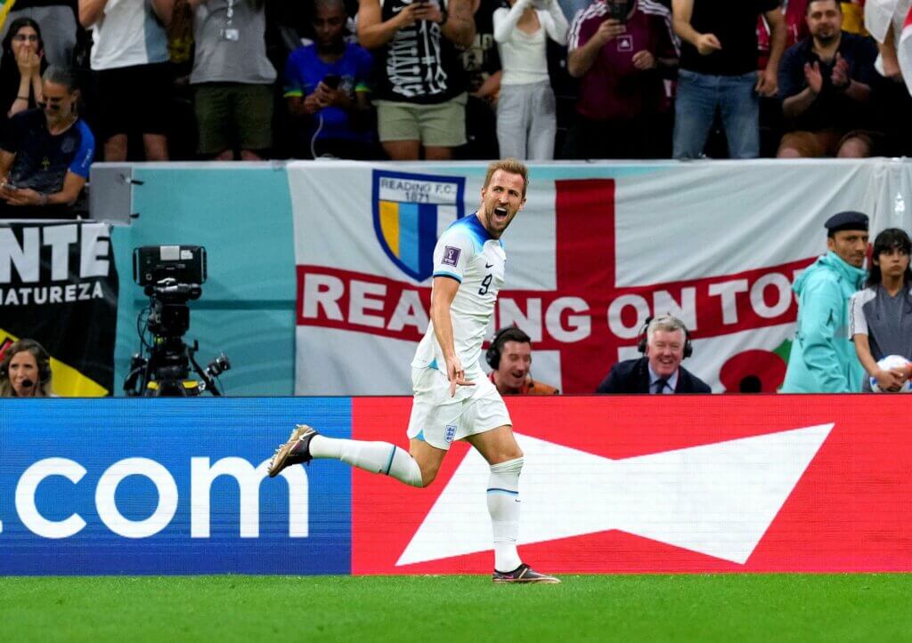 Harry Kane celebrating as he scores his first goal of the 2022 FIFA World Cup against Senegal.