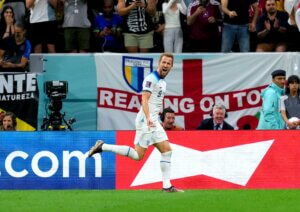 Harry Kane celebrating as he scores his first goal of the 2022 FIFA World Cup against Senegal.