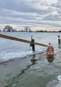 Julia McGowan enjoying outdoor swimming surrounded by ice.